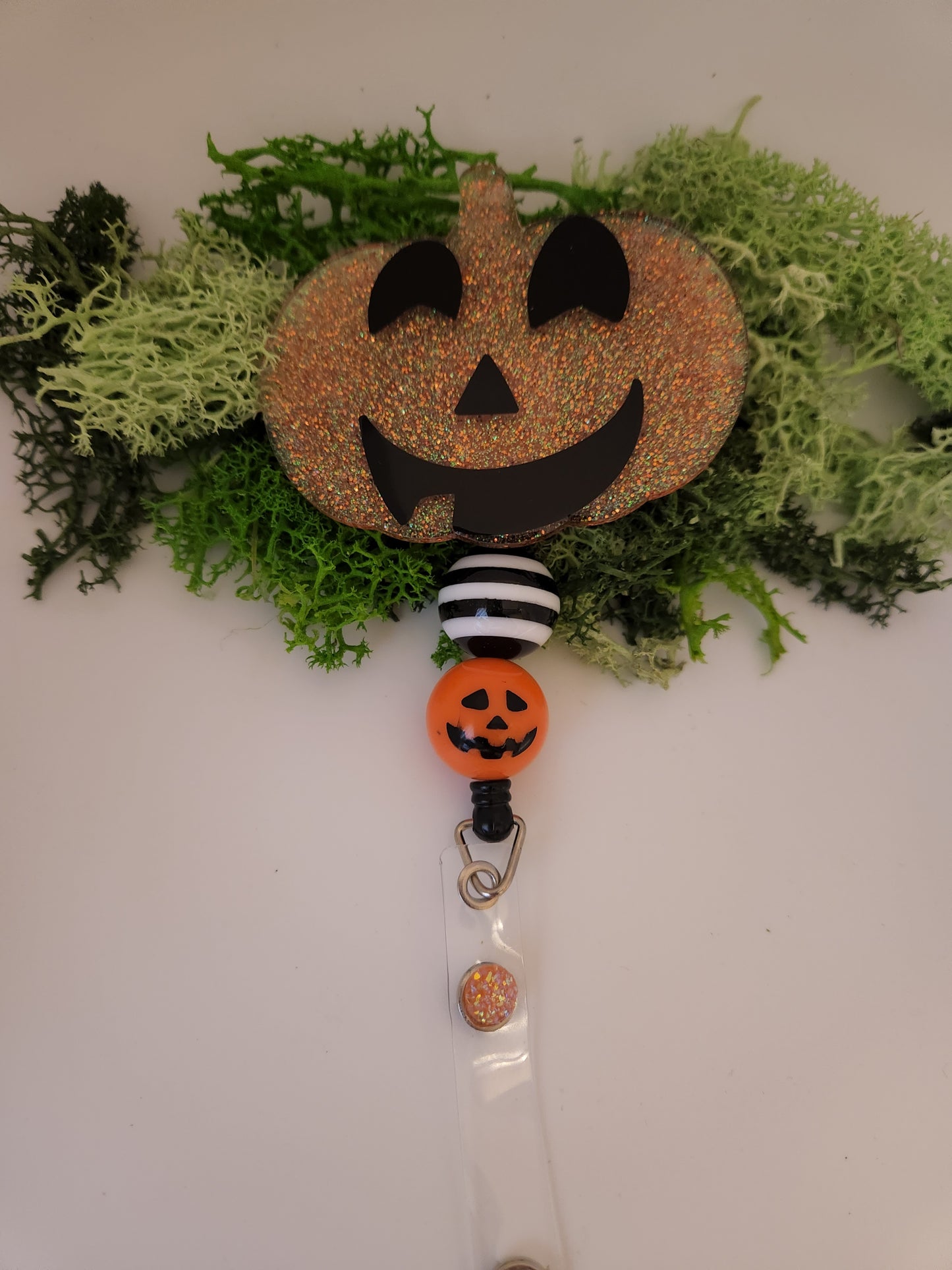 PUMPKIN BADGE REEL