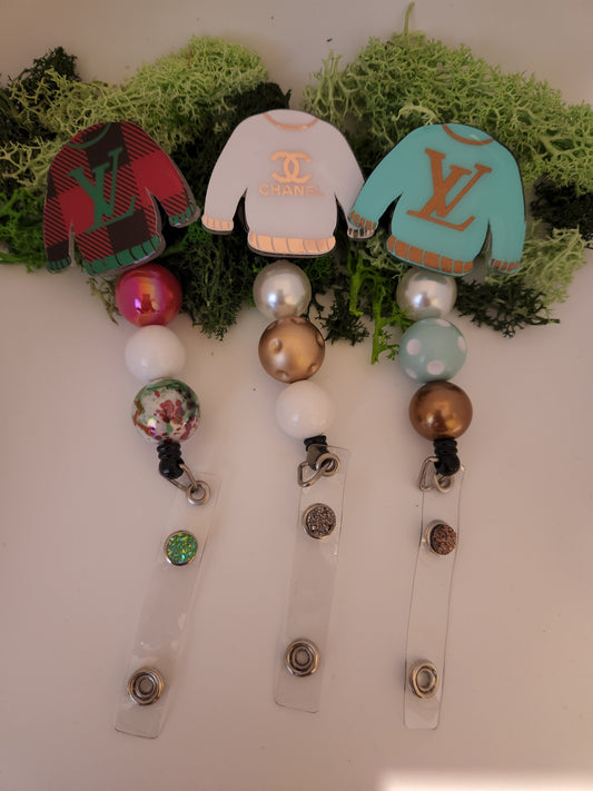 UGLY SWEATER BADGE REEL